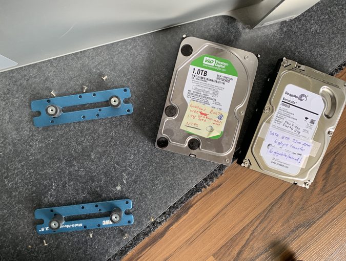 Two hard drives on the floor